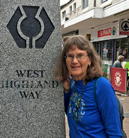 Carol at the West Highland Way Obelisk
