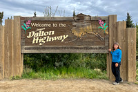 Carol at the Start of the Dalton Highway North of Fairbanks