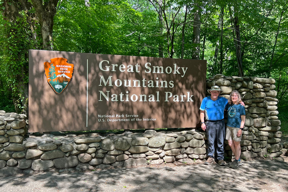 John and Carol at National Park Entrance Sign